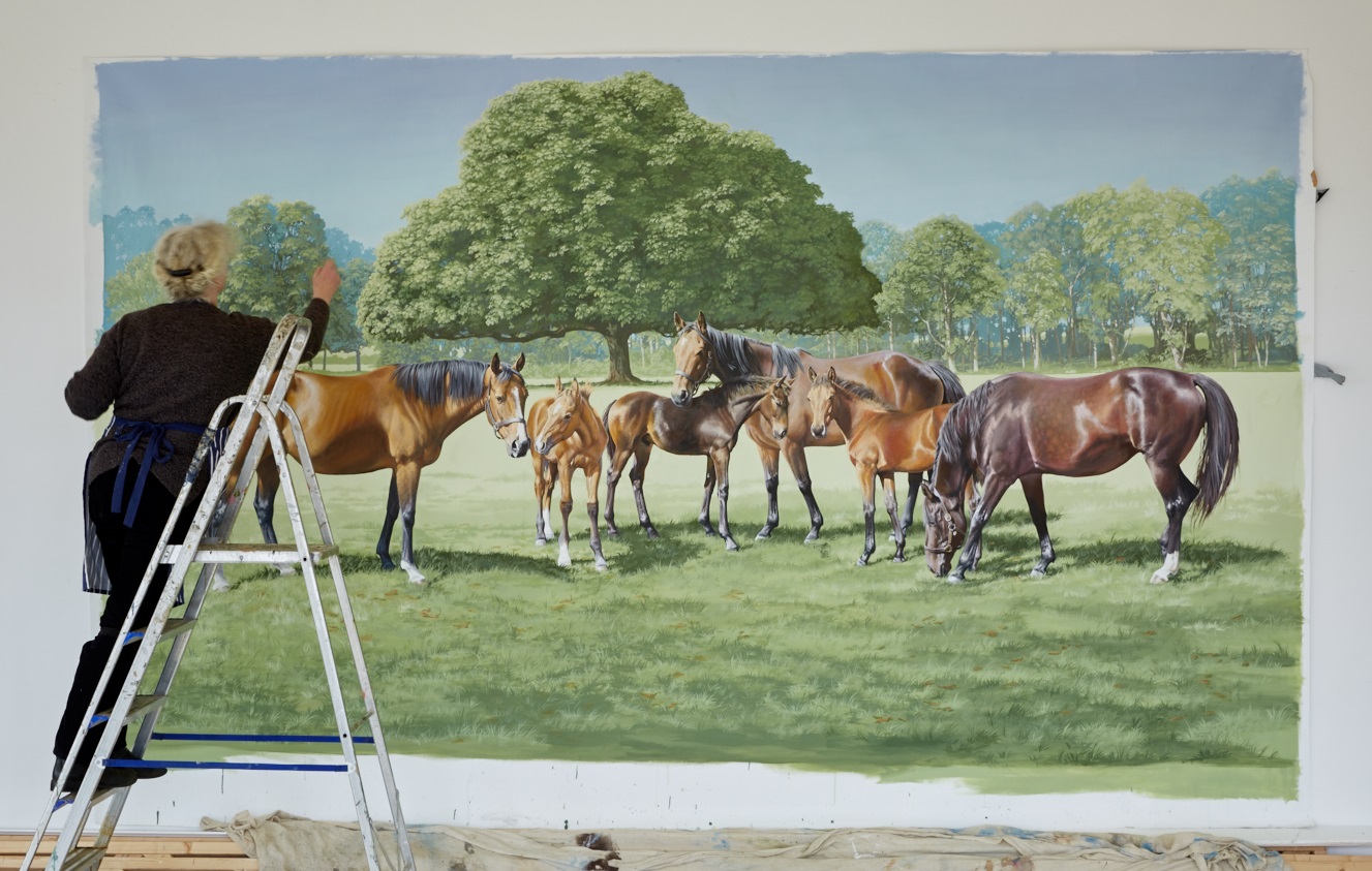 Caught by the photographer doing some last minute painting.